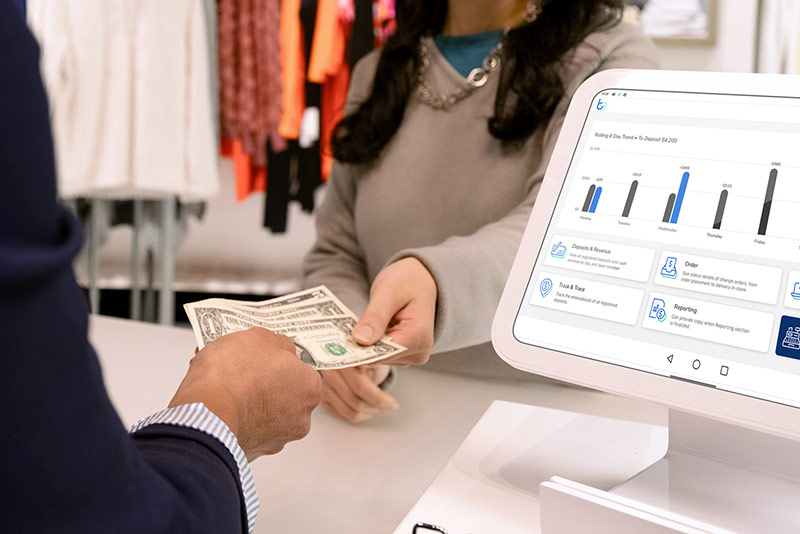 Woman transferring cash in business transaction